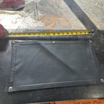 Lund Front Storage Flap Cover. Fixed Price $50.00.